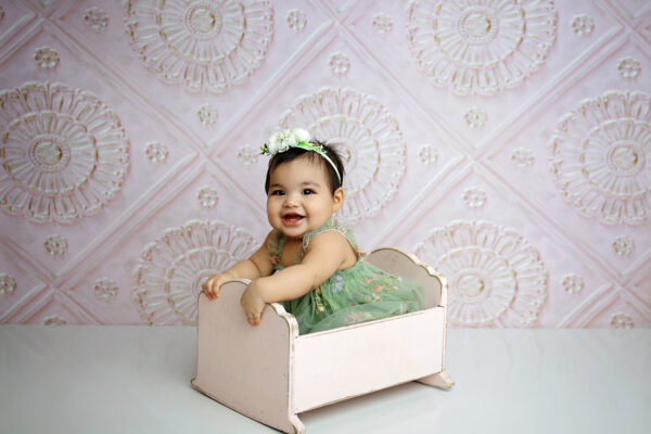 san antonio milestone photograher pink backdrop