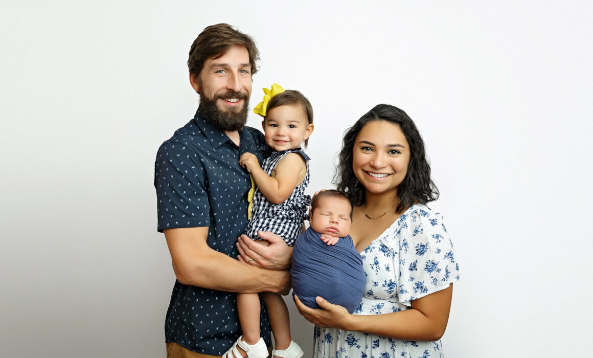 Family newborn photo with baby boy in San Antonio studio