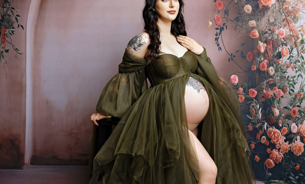 Elegant floral maternity session in San Antonio with green gown