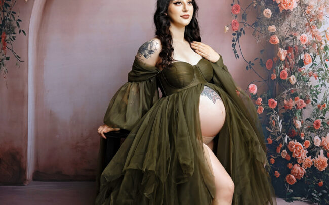 Elegant floral maternity session in San Antonio with green gown