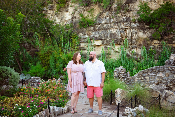 Couple laughing together during a summer family photography session in San Antonio